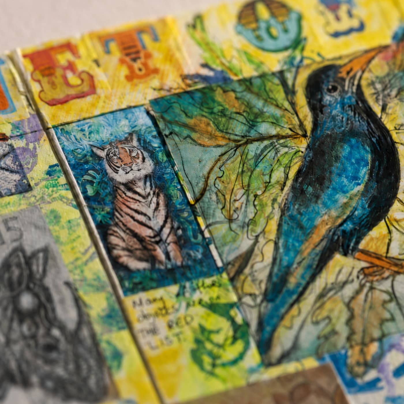 Colourful textile collage featuring animals and nature.