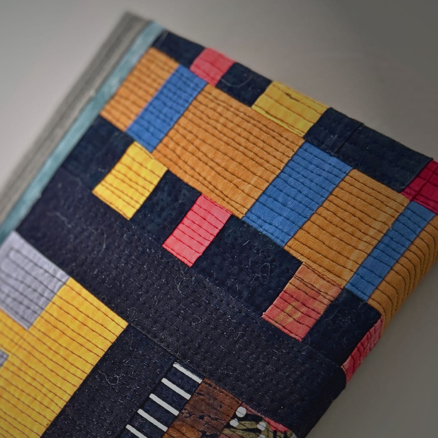 A machine stitched and quilted piece