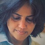 A close up image of textile artist Rachna Garodia working in her studio.