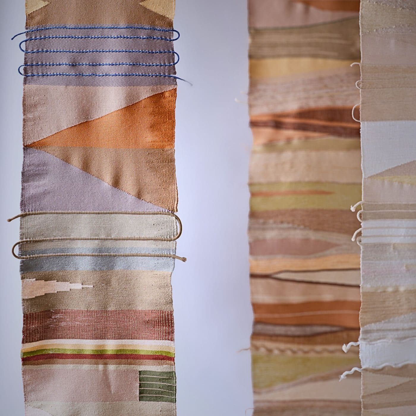 Handwoven textile artwork made with natural materials