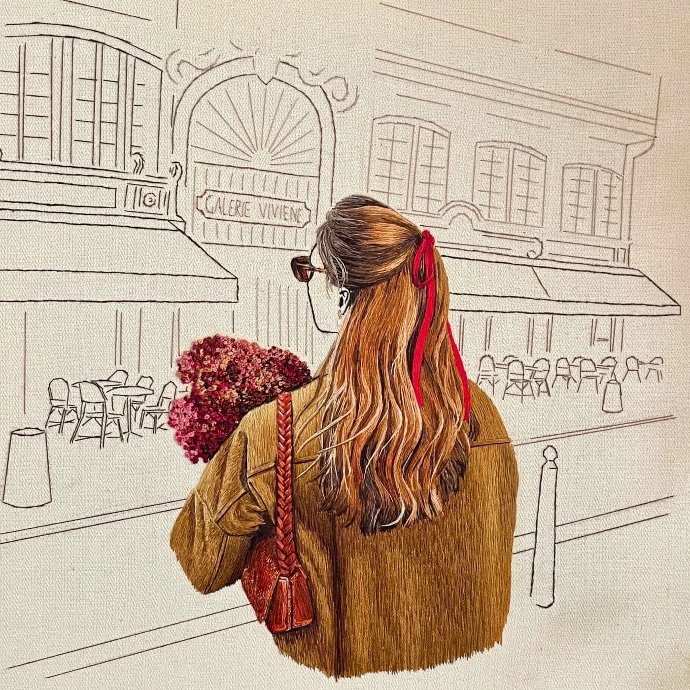 A stitched artwork of a  woman with a bouquet of flowers standing in front of a restaurant. 