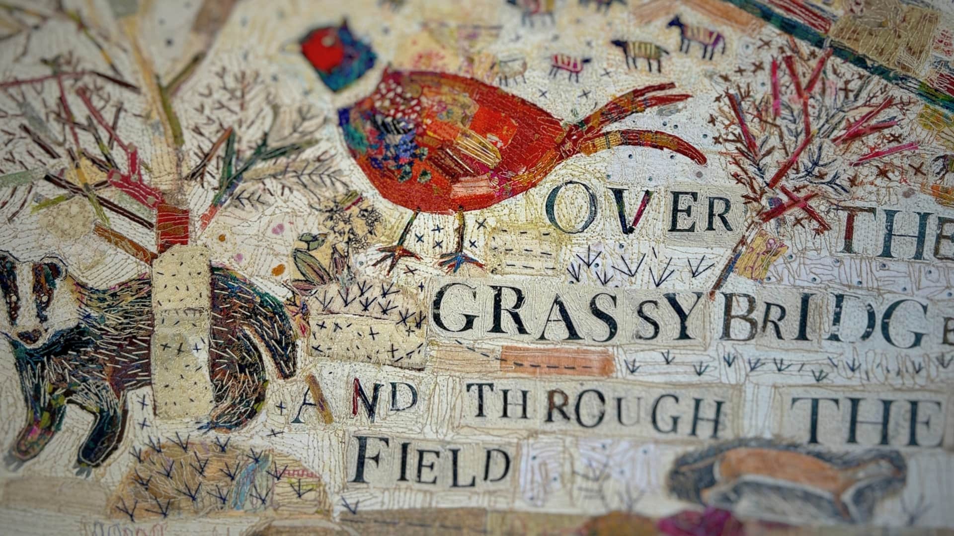 Colourful textile artwork featuring animals and text