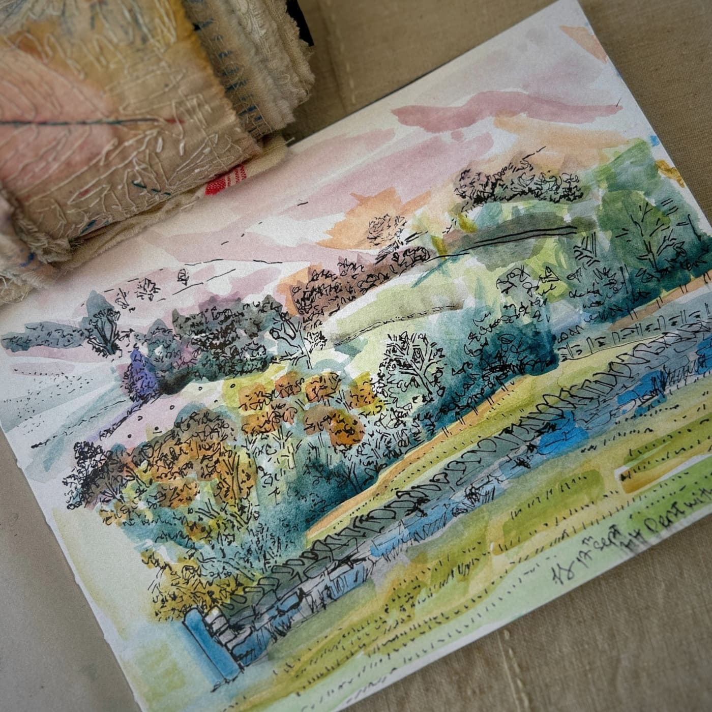 Watercolour landscape with vibrant foliage