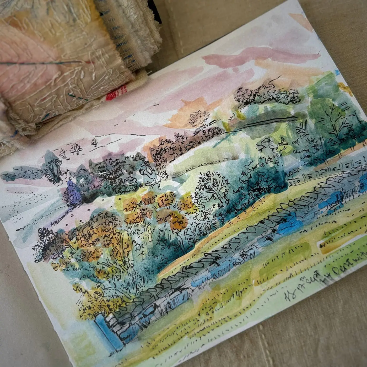 Watercolour landscape with vibrant foliage