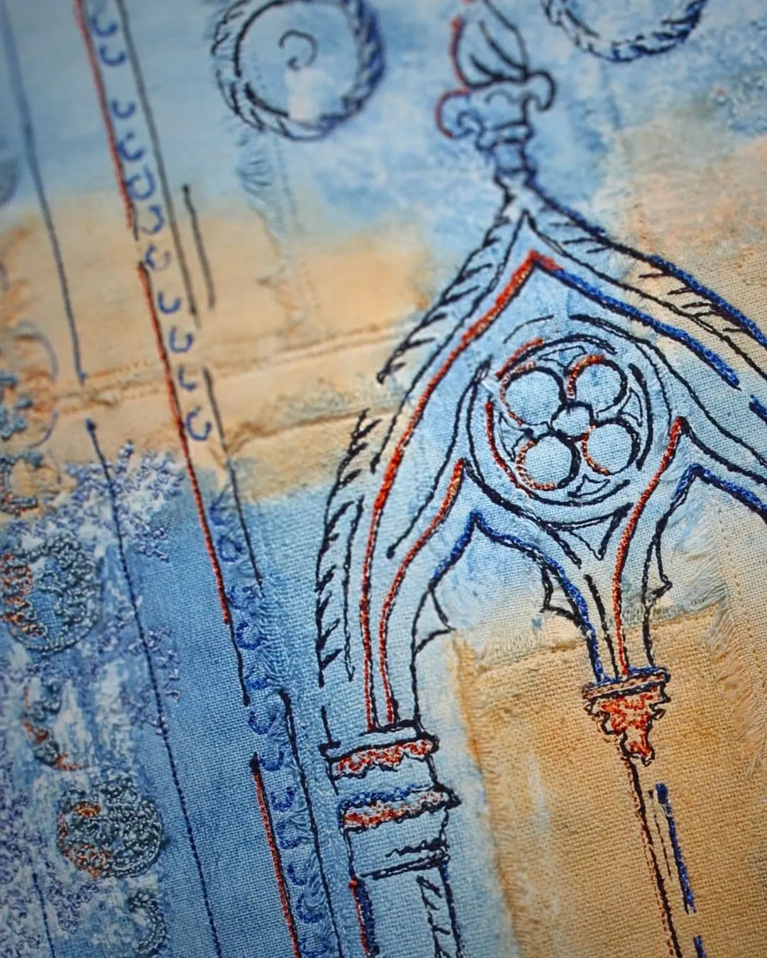 Close up textile artwork of a Venetian window.